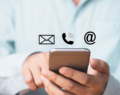 man on phone updating contact info