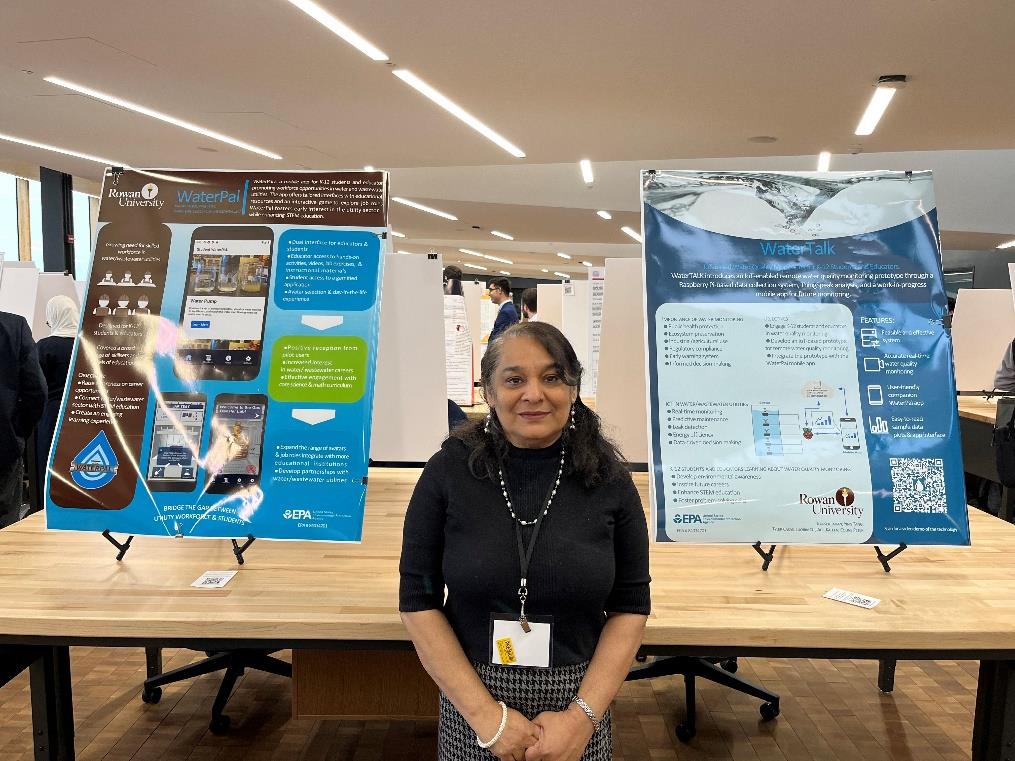 Kauser Jahan in front of posters