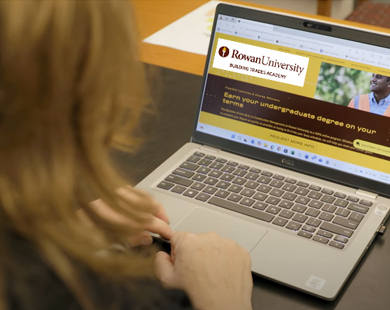 woman looking at BTA website on laptop