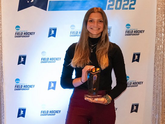 Abby Hainsworth receiving field hockey award
