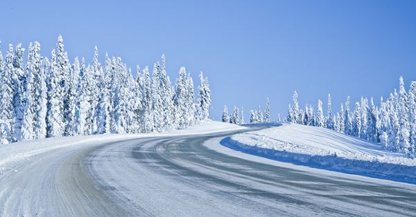 stock photo of snowy alaskan road and landscape